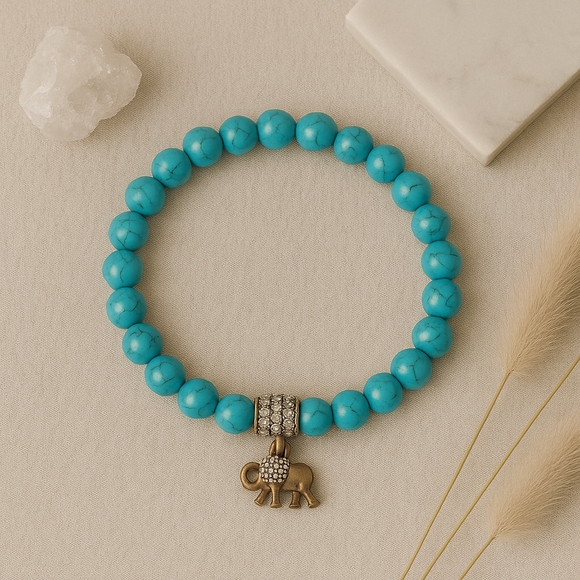 Earth Art hand crafted artisan Jewelry - Reconstituted Turquoise Bracelet with elephant charm Stretchy